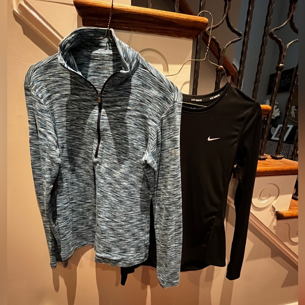 Columbia Blue/Black top and Black Nike top